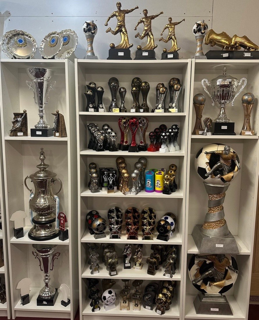 Trophy shelves in the Morgan Sports shop